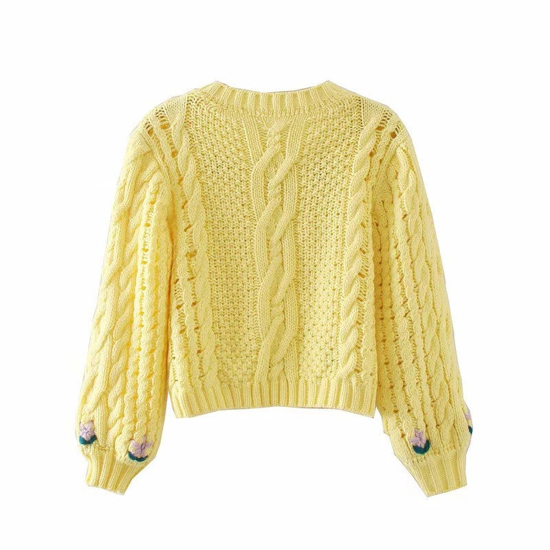 Elegante gelbe Pullover mit Puffärmeln